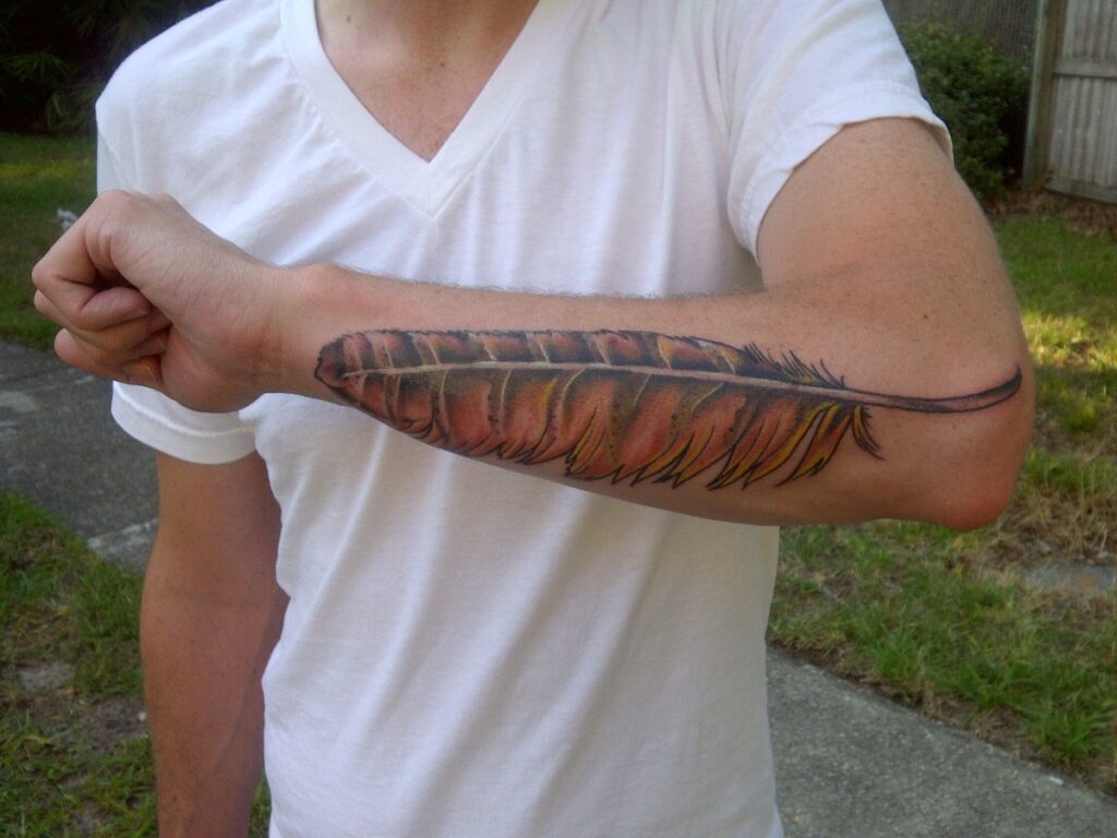 Hawk feather tattoo